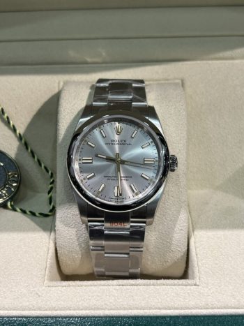 https://dwatchluxury.com/wp-content/uploads/2023/01/Dong-Ho-Rolex-Oyster-Perpetual-Fake-11-768x1024.jpg